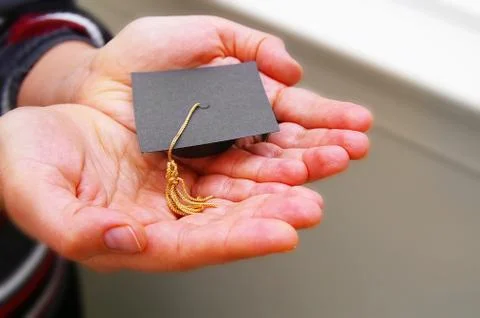 Education in hands Stock Photos