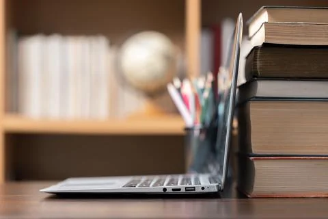 Education learning concept. Book in library with old open textbook, stack p.. Stock Photos
