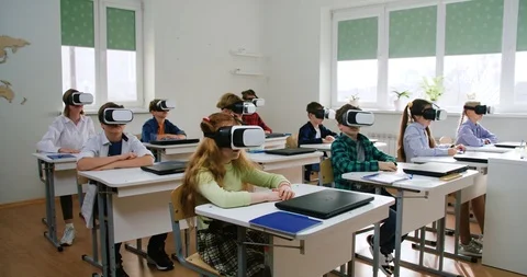 Education at modern school, childs in virtual reality glasses, learning  Stock Footage 121241545