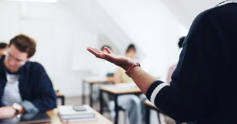 Education, teacher or students in class with hand, exam preparation or lear.. Stock Photos