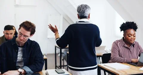 Education, teacher or students in class for lecture, exam preparation or le.. Stock Photos