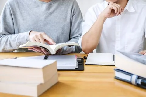 Education, teaching, learning concept. High school students or classmates gro Stock Photos