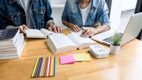 Education, teaching, learning concept. High school students or classmates gro Stock Photos