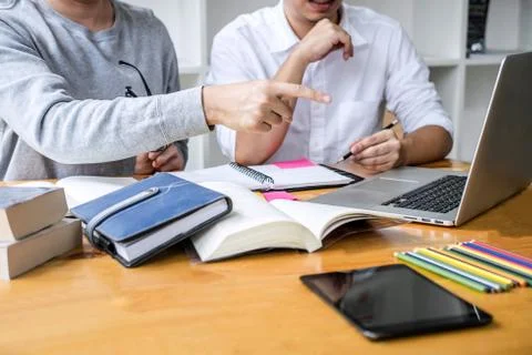 Education, teaching, learning concept. High school students or classmates gro Stock Photos