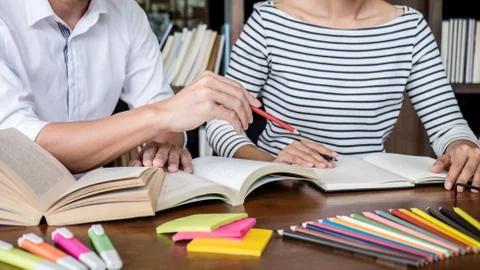 Education, teaching, learning concept. Two high school students or classmates Foto stock