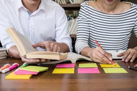 Education, teaching, learning concept. Two high school students or classmates Stock-Fotos