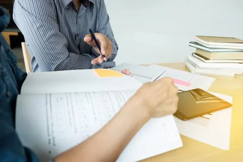 Education, teaching, learning, technology and people concept. Two high school Stock Photos