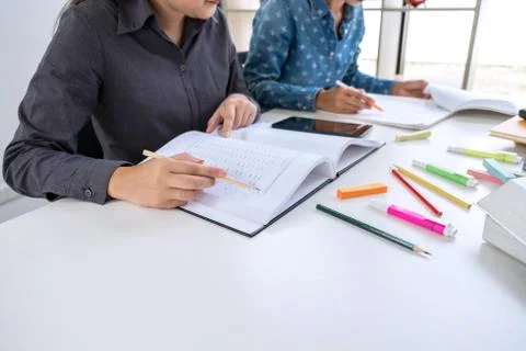 Education, teaching, learning, technology and people concept. Two high school Stock Photos