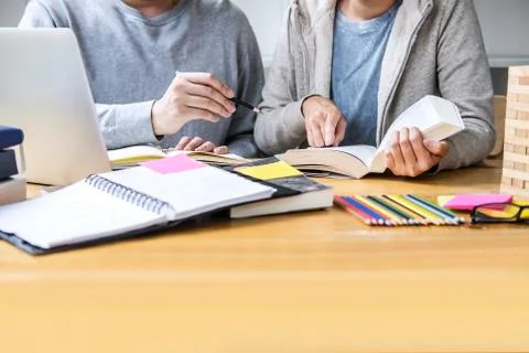 Education, teaching, learning, technology and people concept. Two high school Stock Photos