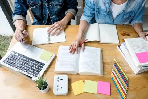 Education, teaching, learning, technology and people concept. Two high school Foto stock