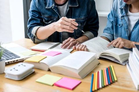 Education, teaching, learning, technology and people concept. Two high school Stock Photos
