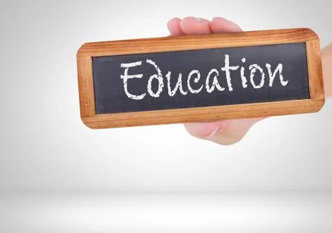 Education text on blackboard Stock Photos