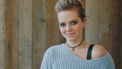 Education, woman and face of student by wall for knowledge, studying or learning Stock Footage 334757953