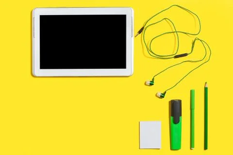 Educational accessories and a tablet pc Stock Photos