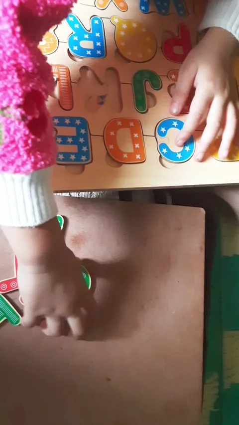 Educational Alphabet Puzzle Activity Featuring  Wooden Letters Video stock 342030527