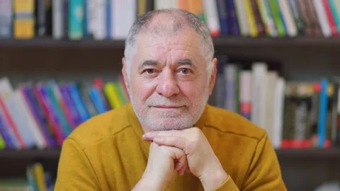 Educational Aura Front View Portrait of Senior Man in Library Stock Footage 327920474