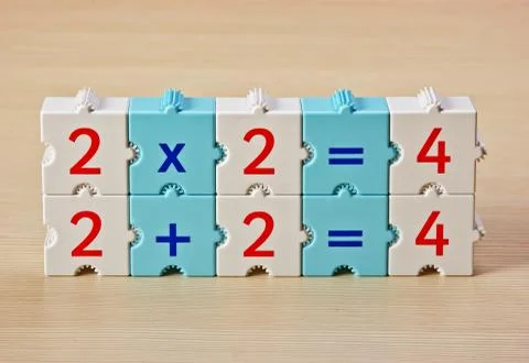 Educational blocks with math problems on the table Stockfoto's