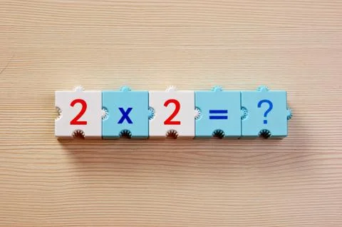 Educational blocks with math problems on the table 스톡 사진