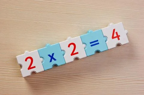 Educational blocks with math problems on the table Foto stock
