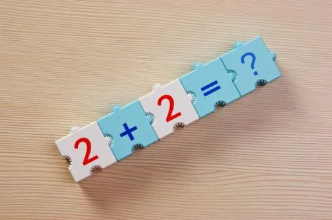 Educational blocks with math problems on the table Foto stock