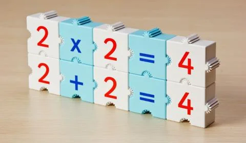 Educational blocks with math problems on the table Foto stock