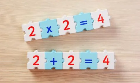 Educational blocks with math problems on the table 스톡 사진