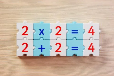 Educational blocks with math problems on the table 스톡 사진