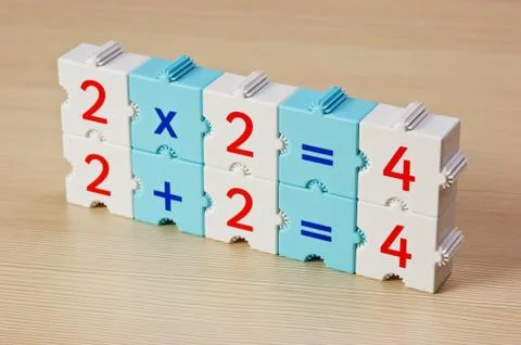 Educational blocks with math problems on the table Foto stock
