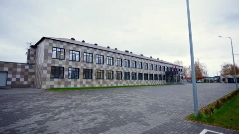 Educational building with unique checkered tiled facade Vídeos de archivo 333669648