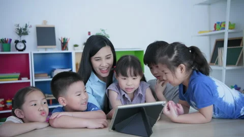 Educational concept of 4k Resolution. kindergarten teacher teaching children  Video stock 218159408