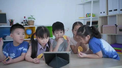Educational concept of 4k Resolution. kindergarten teacher teaching childre.. Video stock 253650745
