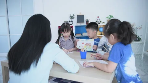 Educational concept of 4k Resolution. Kindergarten children are explaining .. Stock Footage 312700676
