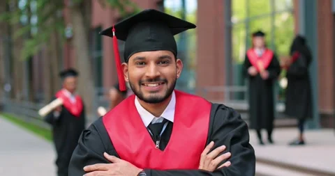 Educational concept. Happy multiracial student boy being happy at his diploma Stock Footage 155740830