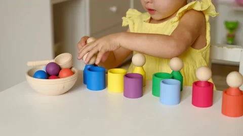 Educational toy sorter with cups and figures for preschoolers Stock Footage 159822890