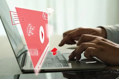 An educational video person using laptop with digital educational icons and g Stock Photos