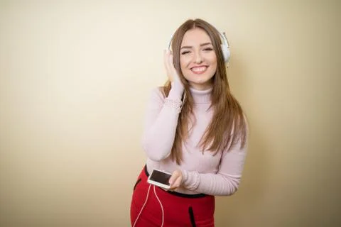 Educative content. Study english language with audio lessons. Girl listen music Stock Photos