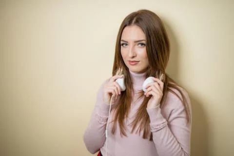 Educative content. Study english language with audio lessons. Girl listen music Stock Photos