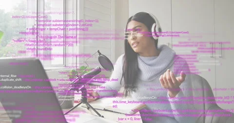 Educator starting laptop, live-coding with pink code overlay via microphone for Stock-Footage 318644184