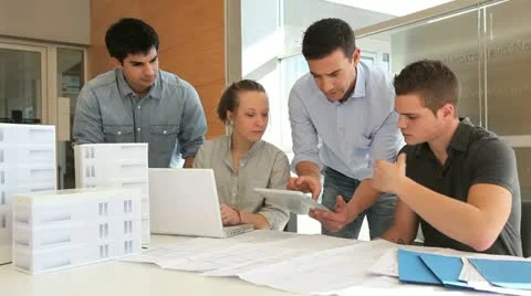 Educator with students in architecture working on electronic tablet Stock Footage 14827107