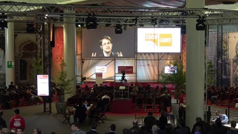 Edward Snowden live video conference on exhibition fair Cebit 2017 in Hannover Stock Footage