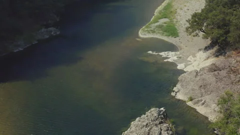 Eel River Swimming Hole in Wind Aerial Pullback Stock Footage 252964426