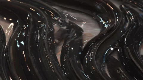 Eels laying on a metallic surface in a market Stock Footage 327990582