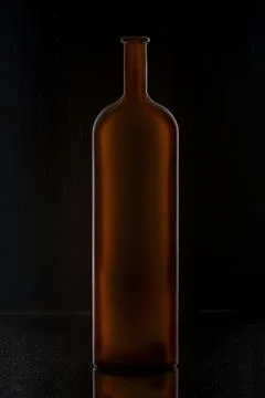 Eempty bottle of red wine Stock Photos