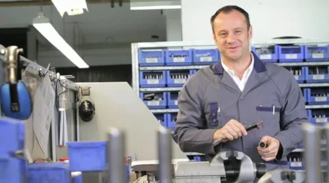 Eengineer measuring, looks satisfied Stock Footage 11899499