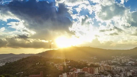 Eerial time lapse of sunset over the Tibidabo mountain of Barcelona, Spain Video stock 79813834