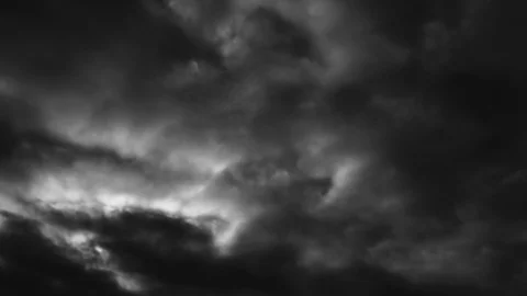 Eerie fast moving clouds, backlit by the low full moon Stock-Footage 92756342