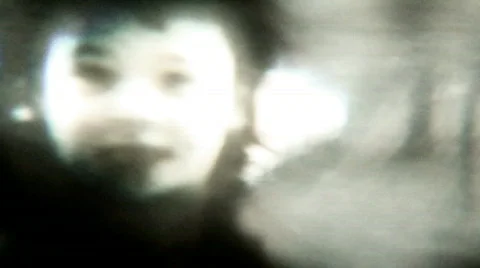 Eerie girl running up close - Vintage 8mm Film footage Stock Footage