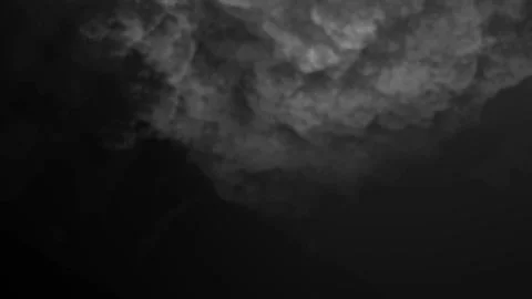 Eerie smoke cloud rolling in, perfect for dramatic cinematic effects and Stock Footage 315309534