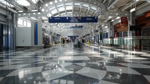 Eerily empty O'Hare Terminal 1 during COVID-19 Stock Footage 128627434