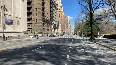 Eerily quiet &amp; empty day on Central Park West NYC during COVID-19 Pandemic Stock Footage 127994779